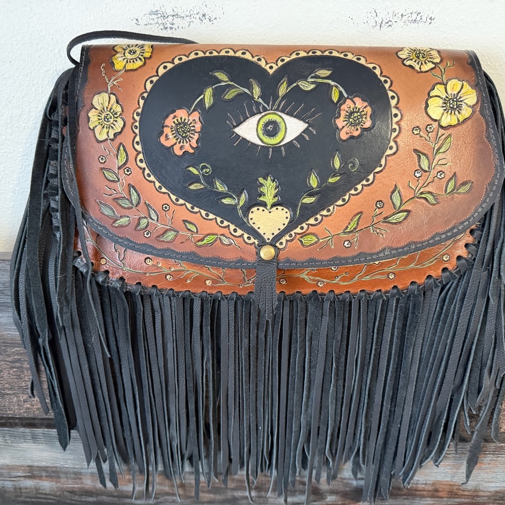Handmade Brown Leather Fringe Shoulder Bag with Black Heart Eye Motif